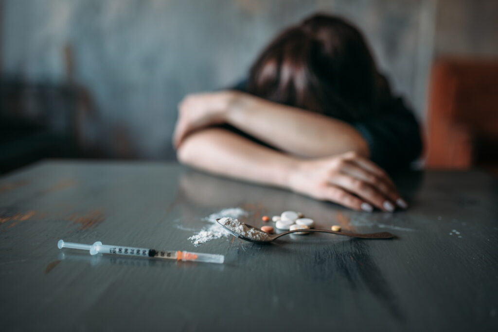A person struggling with addiction — the community HepCURE reaches and supports
